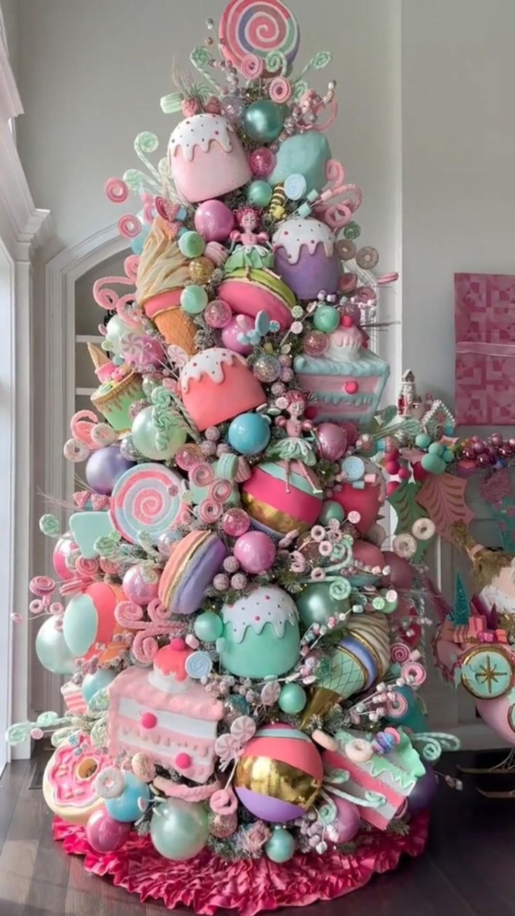 a colorful christmas tree with lots of ornaments