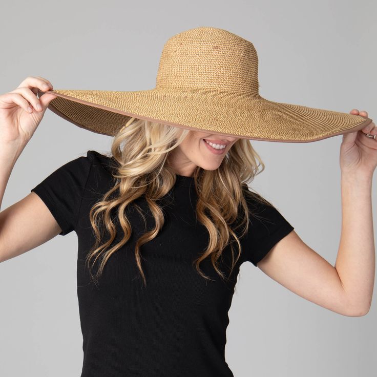 Protect yourself from the sun in style with this Sun Dial Women's Ultrabraid Round Crown Floppy. Its 8" wired brim and adjustable fit are designed for maximum comfort and sun protection with UPF 50+. Crafted to perfection with 75% paper and 25% polyester, this floppy hat comes in Toast color that adds the perfect finishing touch to your outfit. Features: Color: Toast Material: 75% Paper, 25% Polyester Brim Size: 8" Size: 57cmSun Protection: UPF 50+ Adjustable Sun Dial, Wide Brim Hat Summer, Sand Collection, Outdoor Cap, Hat Clips, Summer Favorites, Scarf Poncho, Dress Hats, Protect Yourself