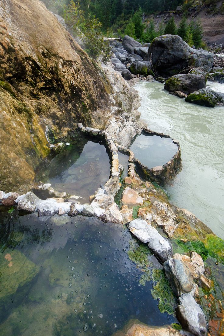 the water is running through some rocks in the river