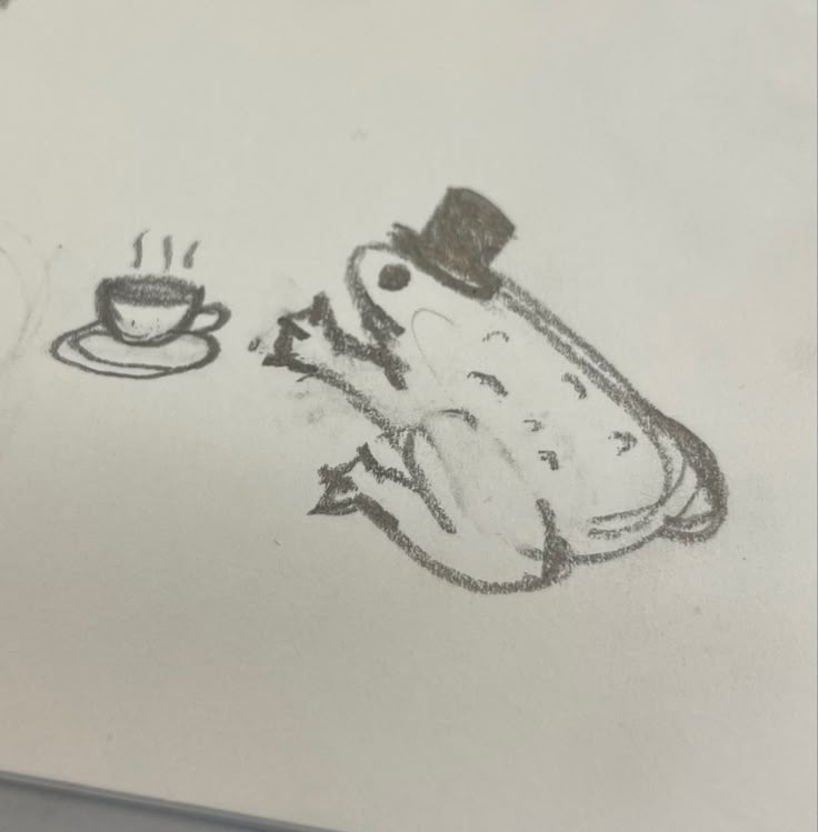 a drawing of a frog holding a coffee cup