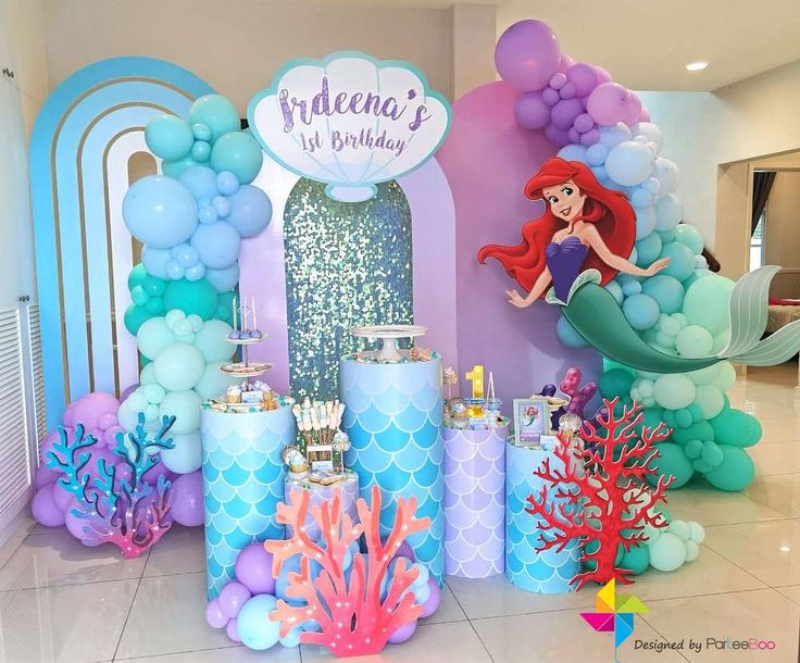 the little mermaid birthday party is complete with balloons, decorations, and decorating items