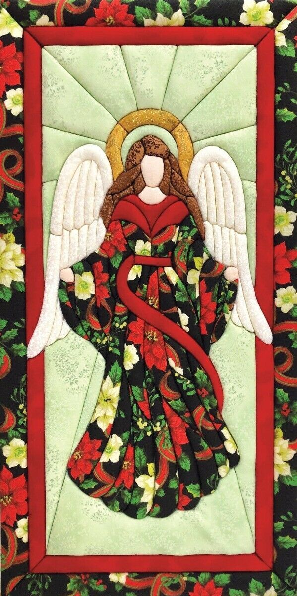 an angel with red and green flowers on it