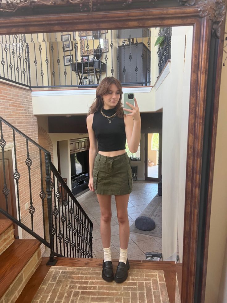 Cargo Skirt Green Outfit, Denim Green Skirt Outfit, How To Style A Green Cargo Skirt, Green Miniskirt Outfits, Mini Green Skirt Outfit, Cargo Skirt Outfit Aesthetic, How To Style A Green Skirt, Green Jean Skirt Outfit, Green Cargo Mini Skirt Outfit