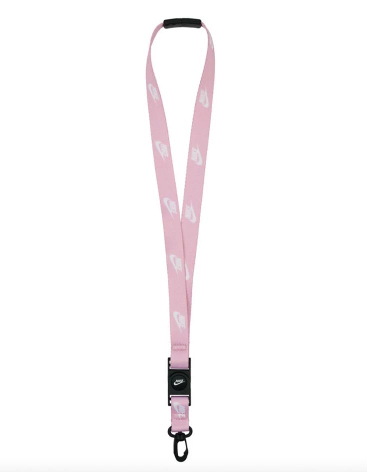 a pink lanyard with white hearts on the front and black clippings is shown