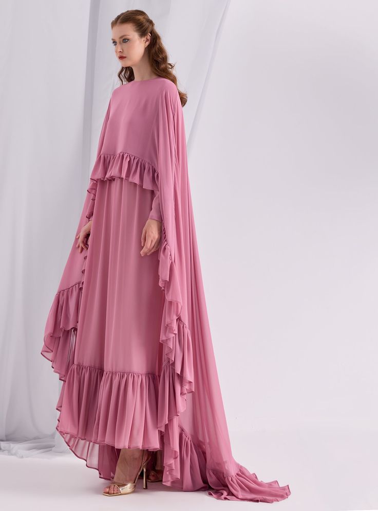 WF ATELIER Model height: 177 CM 100% Polyester Length: 140 cm Pink Floor-length Dress With Ruffle Hem, Spring Gown With Ruffled Skirt, Flowy Floor-length Dress With Ruffle Hem, Long Sleeve Chiffon Dress With Ruffles, Flowy Maxi Dress With Cape Sleeves For Spring, Feminine Floor-length Dress With Ruffle Hem, Spring Gown With Ruffles, Long Dress Shape, Spring Gown With Ruffles, Long Dress, Long Gown With Ruffles For Spring