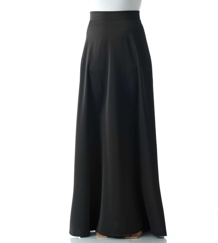 Experience effortless elegance with this luxurious satin maxi skirt, perfect for a variety of formal occasions. Its high waist design and invisible zipper provide a flattering silhouette, while the lack of lining adds a touch of daring. For the best fit, size up if you are in between sizes. At 42 inches long, this skirt exudes sophistication and grace. Hand wash for lasting perfection.