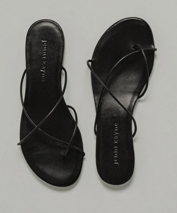 Eve Sandal Black Minimalist, effortless, and refined this strappy sandal is an instant seasonal staple. Nappa Leather. Made in Spain. Flat strappy sandal. | Jenni Kayne Eve Sandal Size 38 Black Summer Shoes, Black Flat Sandals Outfit, Cute Shoes For Summer, Manolo Shoes, Flat Sandals Outfit, Cute Flat Sandals, Eurotrip Outfits, Pu Slippers, Dress Sandals Flat