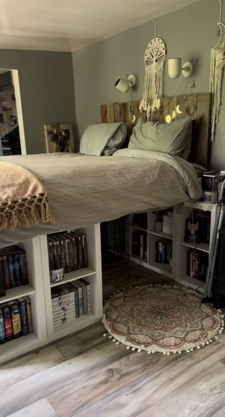 a bedroom with a bed, bookshelf and rugs on the floor in front of it