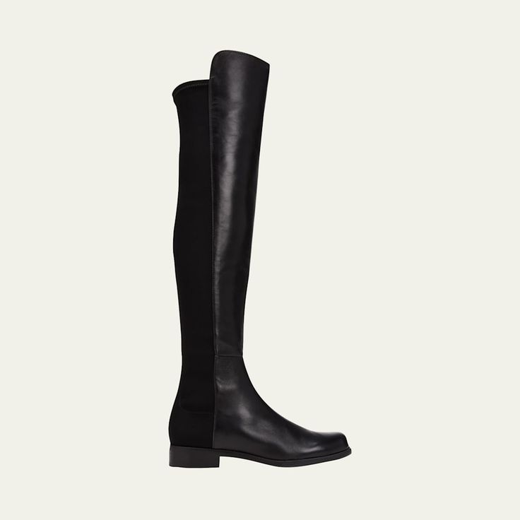 Stuart Weitzman napa leather over-the-knee boot with stretch gabardine back. Measurements: Heel height, 20cm /0.8"; Shaft height, 48cm / 18.9"; Shaft circumference, 35cm / 13.8"; Front shaft extends an additional 1.5" 1" flat block heel. Round toe. Pull-on style. Leather lining and footbed. Rubber sole provides traction. "5050" is made in Spain. Sleek Leather Knee-high Boots With Sculpted Heel, Over The Knee Boots Stuart Weitzman, Luxury Black Knee-high Boots With Leather Lining, Stuart Weitzman Yuliana 60, Stuart Weitzman Boots 5050, Leather Over The Knee Boots, Stuart Weitzman 5050, Knee Boot, Lambskin Leather