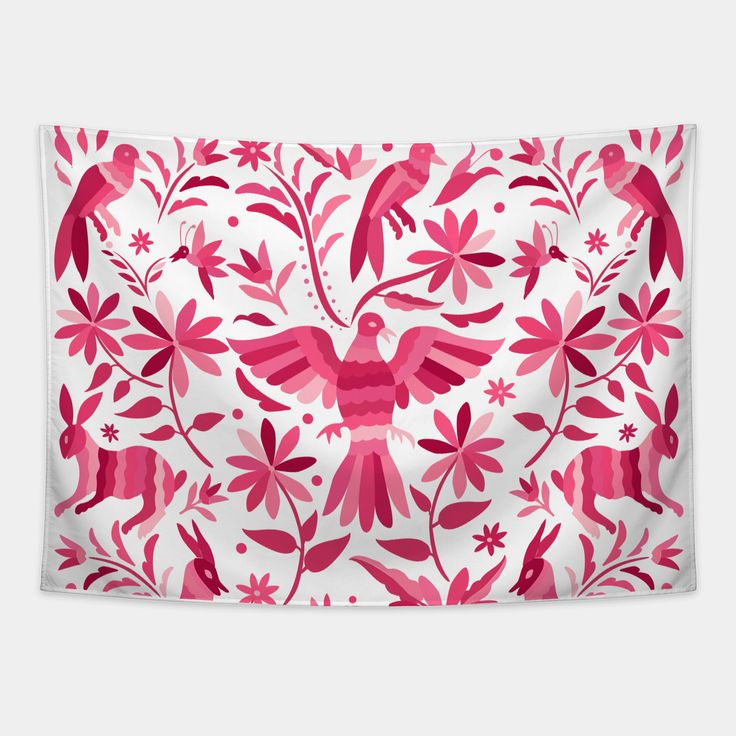 a pink and white wall hanging with birds in the middle, flowers on each side