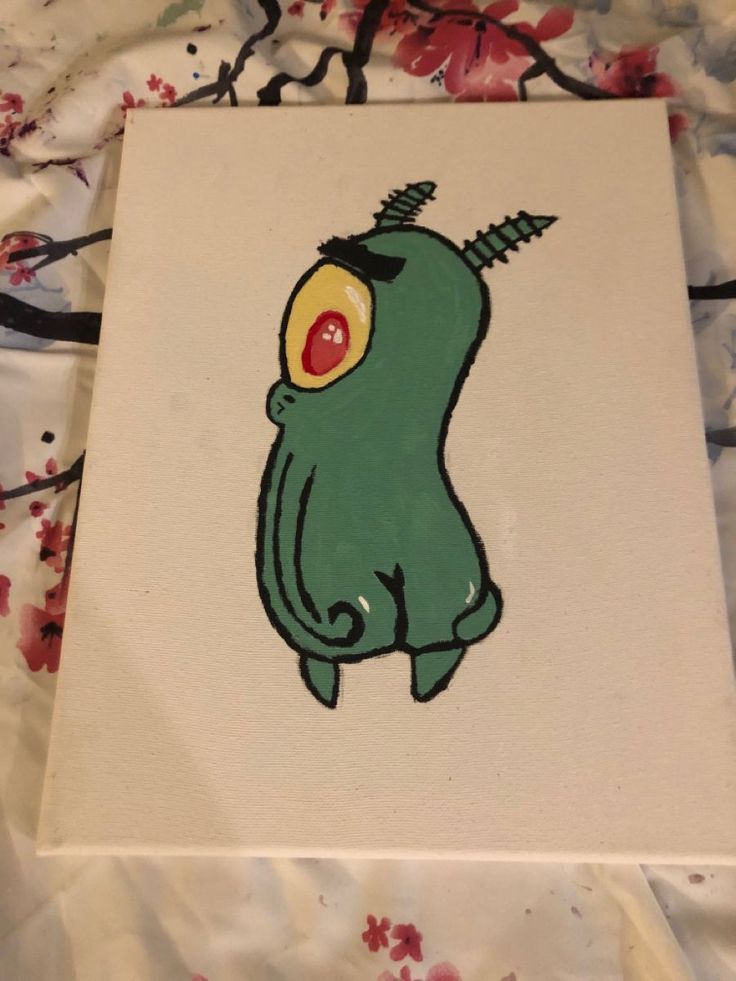 a painting of a green creature with yellow eyes