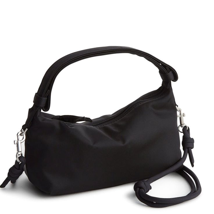 The Roxbury Crescent Crossbody Bag, the epitome of chic style and practical functionality. Crafted with versatility in mind, this sleek and sophisticated bag offers the perfect balance of fashion and convenience for your everyday adventures. Whether you're navigating the city streets, exploring new destinations, or enjoying a night out, this versatile bag keeps your essentials close at hand and your style on point. Vera Bradley Roxbury Crescent Crossbody Bags in Black Chic Nylon Crossbody Bag, Elegant Nylon Bag For On-the-go, Black Baguette Bag For Travel, Versatile Top Handle Baguette Bag For Travel, Trendy Nylon Hobo Crossbody Bag, Chic Nylon Bags For On-the-go, Versatile Black Baguette Bag For Travel, Chic Nylon Bag With Top Handle, Elegant Nylon Crossbody Shoulder Bag