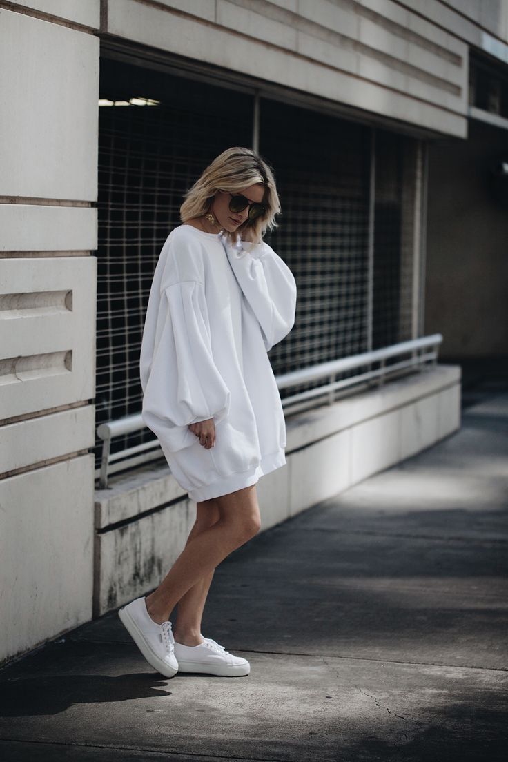 oversized sweatshirt dress + sneakers | @urbanoutfitters Hoodie Dress Outfit, Oversized Hoodie Outfit, Sweatshirt Dress Outfit, Oversized Hoodie Dress, Hoodie Sweatshirt Dress, Woman In White, Oversized Outfit, Balloon Sleeve Dress, Oversize Fashion