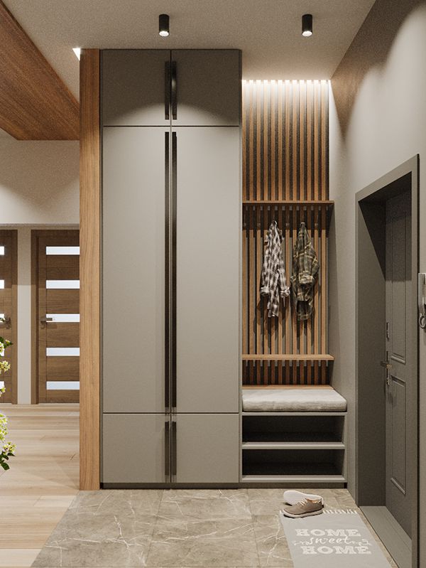 a modern kitchen with wood paneling and stainless steel refrigerator freezer, built into the wall