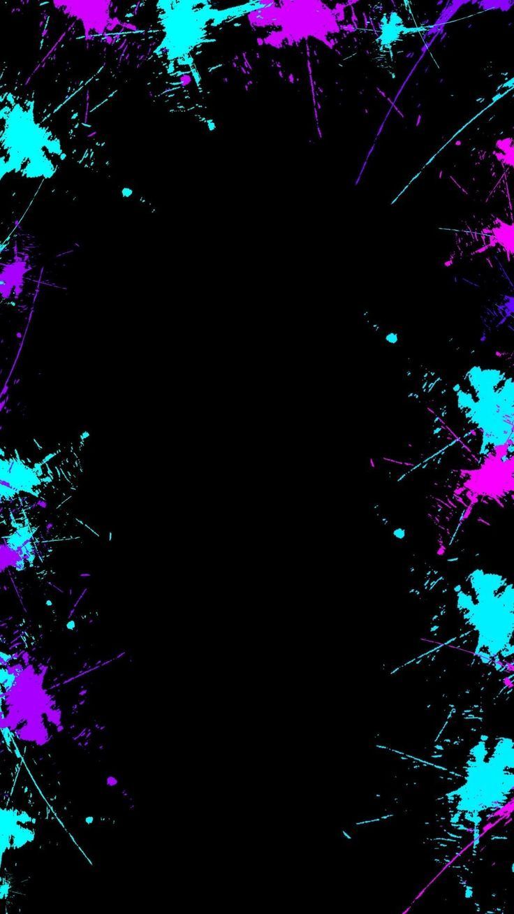 a black background with blue and pink paint splatters