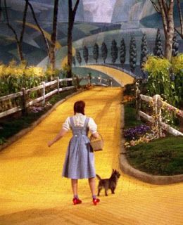 a woman is walking her dog down the road in front of a painted landscape with hills and trees