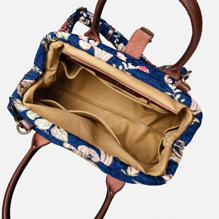 With a nod to the Victorian era, MCW’s freshly combines the classic and elegant design of the traditional carpet bag with a textural and tactile twist.The main body of purse-sized bags is made with thick chenille carpets. The handles and belts are genuine leather with heavy cotton canvas lining. Six bronze stands at the bottom allow the bag to stand stably. Every bag comes with a detachable and adjustable shoulder strap (55 inches) made from the same chenille as the bag and fixed with high-quali Elegant Tapestry Bags With Detachable Handle, Elegant Tapestry Bags With Adjustable Handle, Elegant Tapestry Bag With Leather Handles, Baroque Garden, Victorian Carpet Bag, Vintage Embroidered Top Handle Bag, Victorian Carpet, Traditional Carpet, Blue Carpet