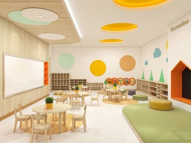 the children's playroom is decorated with colorful circles and trees on the walls