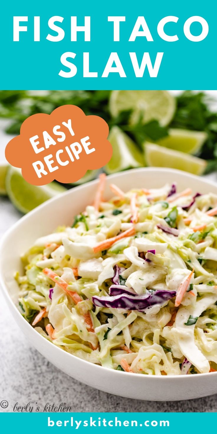 a white bowl filled with coleslaw slaw next to limes and celery