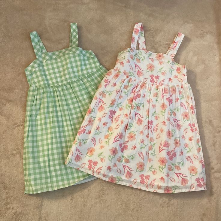 Cupcakes & Cashmere Girls Dresses Size 6. Both Dress Are Lined. First Dress Is White With Floral Print. The Second Dress Is White And Green Checked. Both Dresses Are Sleeveless. Brand New! *Will Not Sell Separate* Sweet Spring Dress For Picnic, Sweet Spring Dresses For Picnic, Sweet Spring Picnic Dress, Sweet Green Cotton Dress, Sweet Style Green Summer Dress, Sweet Green Summer Dress, Playful White Dress For Picnic, Sweet Green Sleeveless Dress, Cute White Picnic Dress