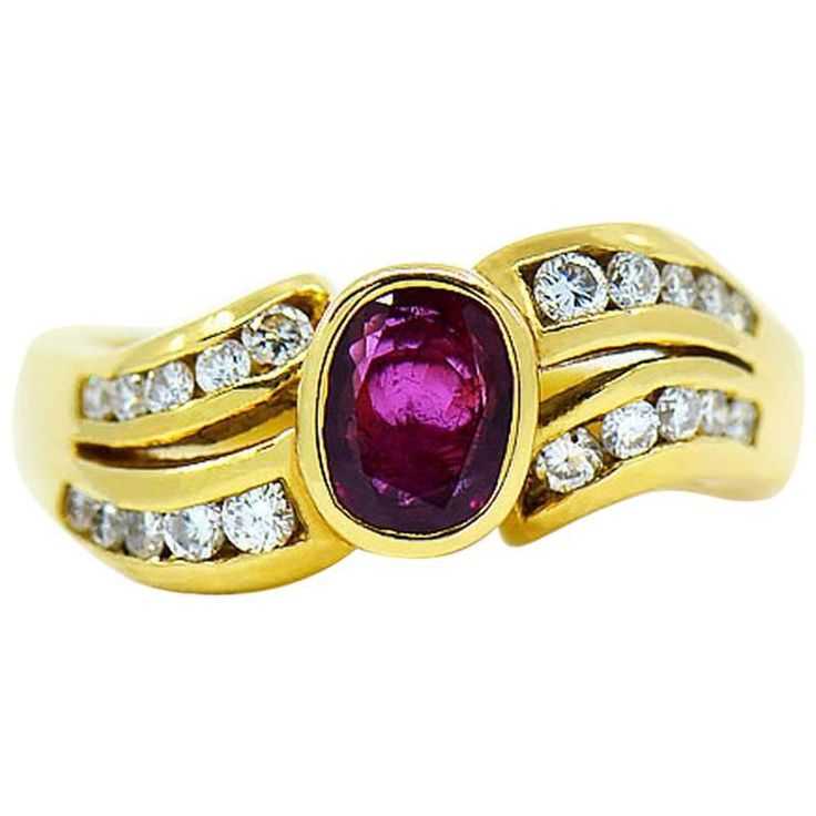 Ruby & diamond ring by Assor Gioielli. Beautiful oval shape red ruby set in a well crafted 18k yellow gold ring & flanked by two rows of round brilliant cut diamonds on both sides in a wave design. The approximately 0.75 carat Ruby measures approximately 6.00 mm x 5.00 mm. Total weight of diamonds is approximately 0.25 carats. This ring is size 7 and can be resized uppon request. Please allow 3 to 4 business days for re-sizing. Total gram weight 7.20 grams. Ring Specifications: Designer: Assor G Ruby Set, Ruby Diamond Ring, Ruby Rings, Ruby Diamond Rings, Ruby Jewelry, 18k Yellow Gold Ring, Wave Design, Ruby Diamond, Ruby Gemstone