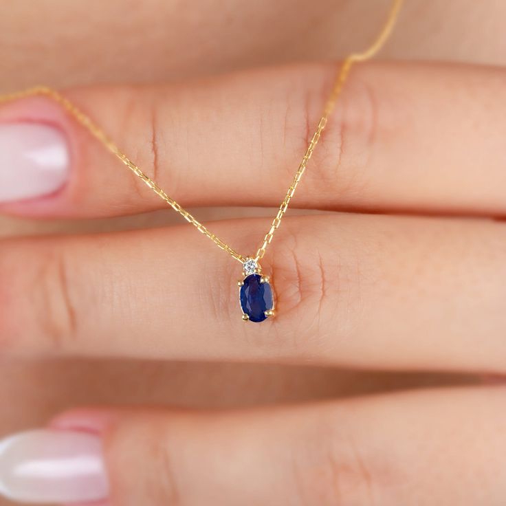 "Sapphire represents commitment in love. Our single diamond oval sapphire necklace is a jewel that you can use daily and on special occasions with its minimalist design. It is a nice gift for yourself and your loved ones. The birthstone of those born in September is sapphire. 🔸🔸 Our elegant, style and stylish products suitable for special occasions and daily use are produced with love and care for you and your loved ones. 🔸🔸 All of our products are carefully crafted from 14K Solid gold and r Oval Sapphire Necklace, Oval Birthstone Necklace In 14k Gold, Oval 14k Gold Birthstone Necklace, Oval Gemstone Birthstone Necklace In Fine Jewelry Style, Oval Sapphire Necklace For Anniversary, Elegant Oval Birthstone Necklace For Anniversary, Dainty Oval Sapphire Jewelry, Oval Birthstone Necklace For Anniversary, Oval Ethical Birthstone Necklace For Anniversary