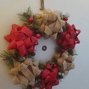 a christmas wreath hanging on the wall