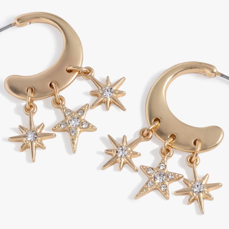 Get celestial guidance with the Star Multicharm Hoop Earrings, featuring a post-back golden hoop with dangling, crystal-detailed star charms. Celestial Hoop Earrings With Star Charm, Hoop Jewelry With Star Charm In Metal, Celestial Star-shaped Hoop Earrings, Metal Hoop Earrings With Star Charm Dangle, Celestial Star-shaped Hoop Earrings With Moon Charm, Celestial Style Dangle Earrings With Star Charm, Celestial Dangle Earrings With Star Charm, Gold Celestial Crystal Dangle Earrings, Celestial Metal Hoop Earrings With Moon Charm