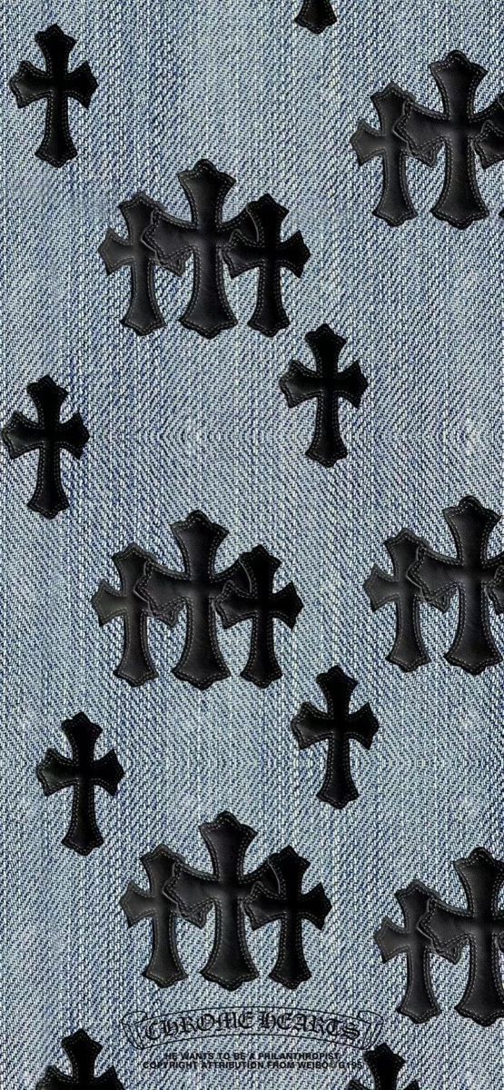 black crosses on light blue denim fabric