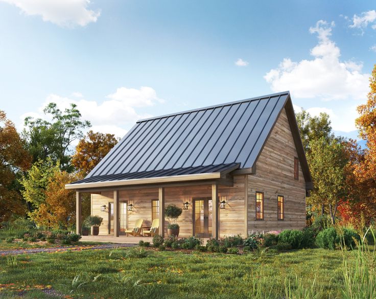 a small log cabin with a metal roof in the grass and trees around it,