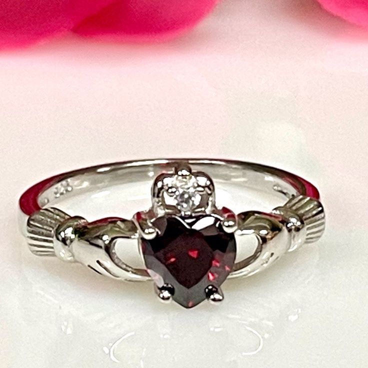 925 Sterling Silver Claddagh Irish Garnet Cz Ring * Metal :925 Sterling Silver * Stone :Grade Aaa Cubic Zirconia *Shape Heart 6mm *Design :Claddagh Irish Promise Rung * Color :White Gold Rhodium For Anti Tarnish. Irish Wedding Rings, Claddagh Ring Wedding, Gothic Engagement Ring, Dream Wedding Ring, Irish Rings, Garnet Heart, Irish Claddagh, Claddagh Ring, Vintage Sterling Silver Rings