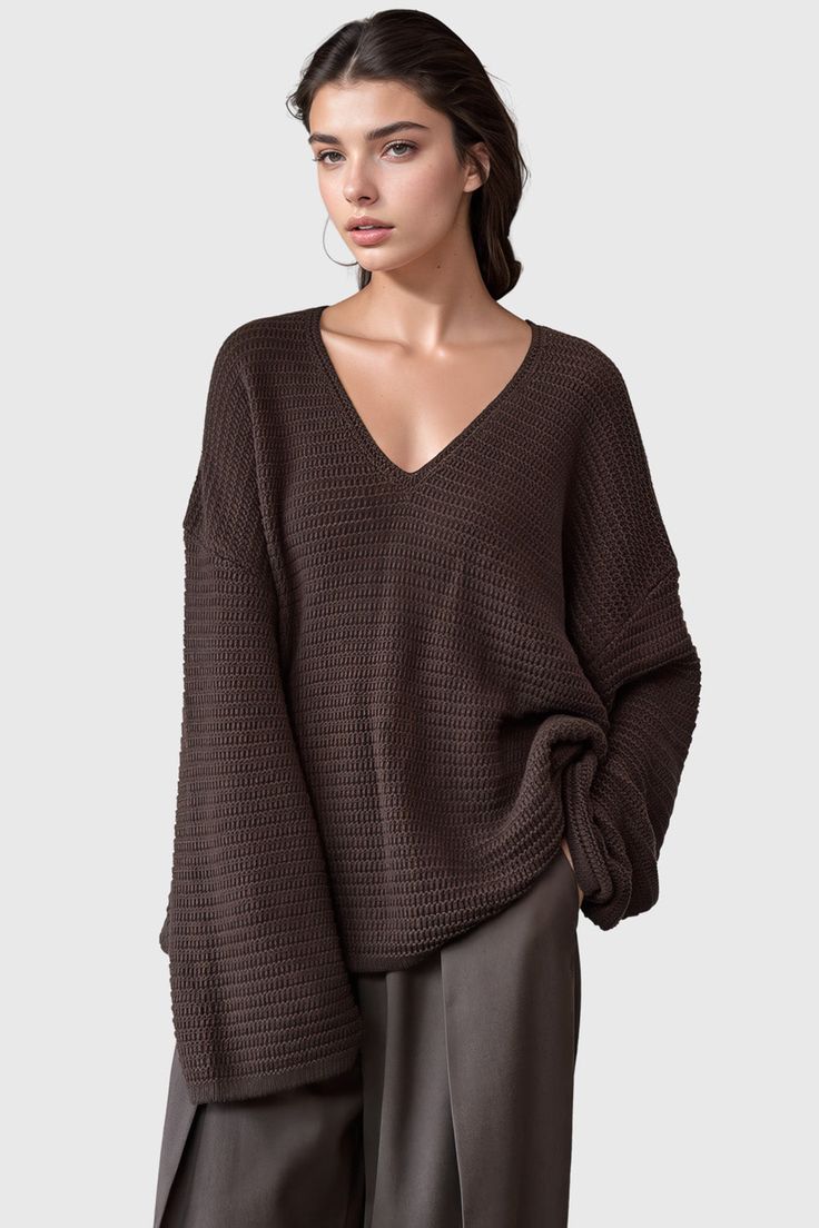 This classic V-neck sweater is an essential staple for your wardrobe. Crafted from a textured, knit fabric, it features long sleeves and a relaxed, loose fit for a timeless aesthetic.Fabric: Cotton, Polyester Aesthetic Fabric, Timeless Aesthetic, Brown Sweater, V Neckline, Textured Knit, V Neck Sweater, Fabric Cotton, Vneck Sweater, Neck Sweater