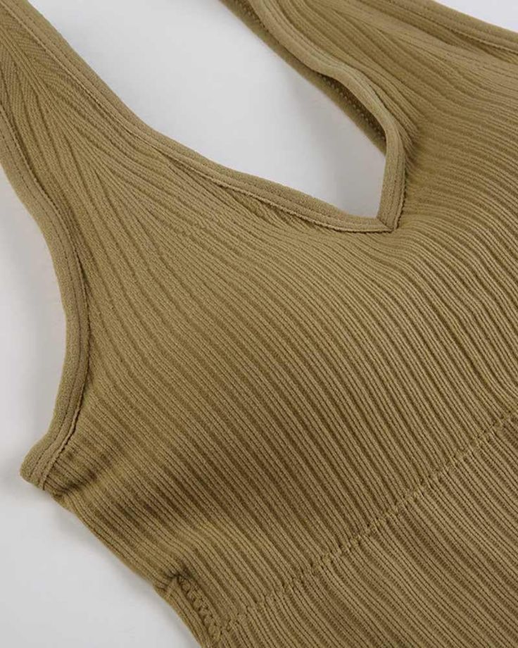 Details: Essential ribbed cami top Top Length: Cropped Sleeve Length: Sleeveless Materials:95% Polyester + 5% Spandex Stretch Ribbed V-neck Tank Top, Solid Ribbed Tank Straps Tops, Solid Ribbed Tops With Tank Straps, Ribbed Cami Camisole, Ribbed Cami Crop Top For Loungewear, Ribbed Crop Top Tank Top For Loungewear, Solid Ribbed Tank Top For Loungewear, Ribbed Stretch Camisole For Loungewear, Ribbed Camisole Top For Loungewear