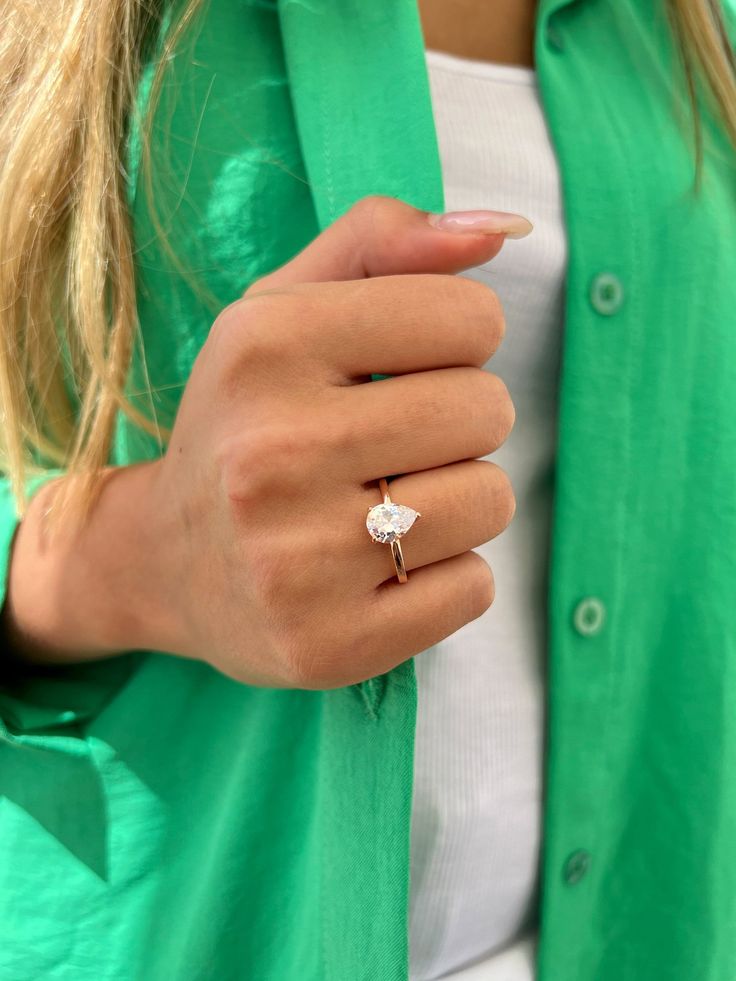 White Gold Teardrop Diamond Ring Gift, Teardrop Diamond Cut Ring Gift, Dainty Diamond Teardrop Rings, Dainty Teardrop Diamond Rings, Dainty Pear-shaped Promise Ring, Delicate Teardrop Ring For Gifts, Pear-shaped Diamond White Rings As Gifts, Sterling Silver Teardrop Diamond Ring Gift, Teardrop Sterling Silver Diamond Ring For Gift