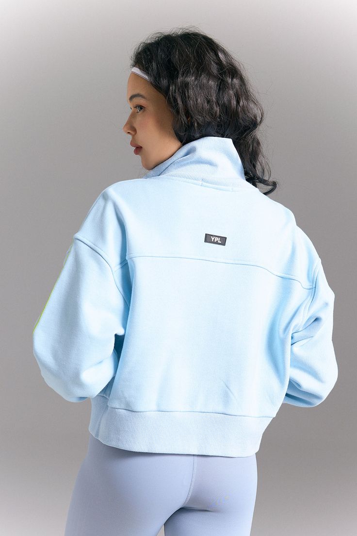 With an suitbale fit and the soft, cozy fabric you love, this new Zip Sweatshirts keeps your post-practice comfort at peak levels. Light Blue Sporty Sweatshirt For Streetwear, Sporty Light Blue Sweatshirt For Streetwear, Blue Winter Activewear For Loungewear, Blue Fleece Sweatshirt For Loungewear, Light Blue Long Sleeve Sweatshirt With Ribbed Cuffs, Blue Cotton Athleisure Sweats, Blue Fleece Sweats For Loungewear, Blue Cotton Sweats In Athleisure Style, Light Blue Sweatshirt With Ribbed Cuffs For Streetwear