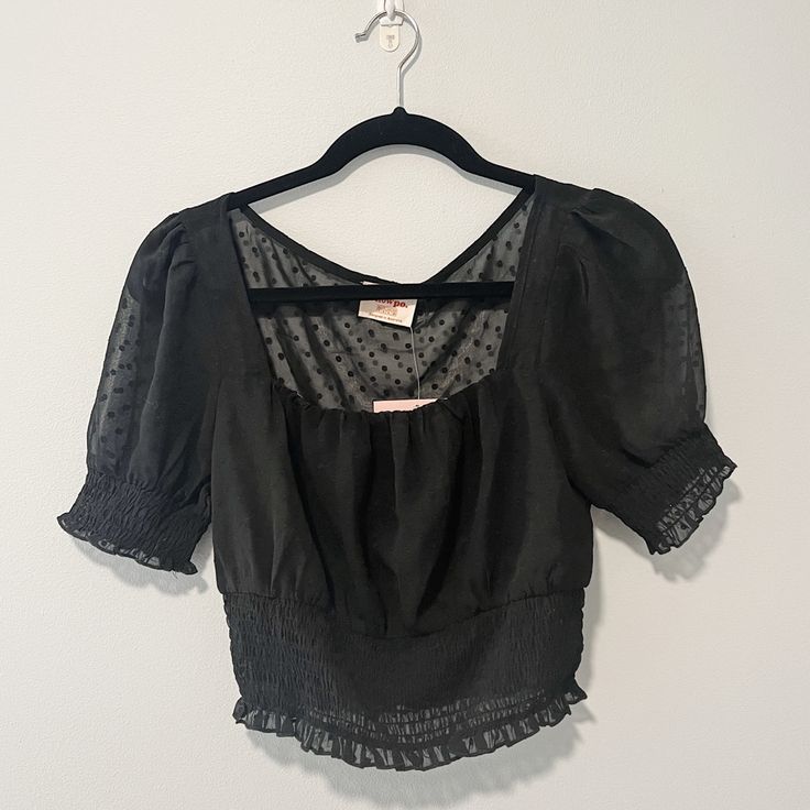 Size Us 6. Nwt In Perfect Condition. Spring Tops With Smocked Bodice For Night Out, Spring Smocked Fitted Top For Night Out, Black Cropped Tops With Smocked Back, Spring Night Out Tops With Smocked Back, Spring Night Out Top With Smocked Back, Black Ruched Blouse For Summer, Black Smocked Top With Ruffles For Day Out, Black Smocked Blouse For Summer, Black Tops With Smocked Bodice And Square Neck