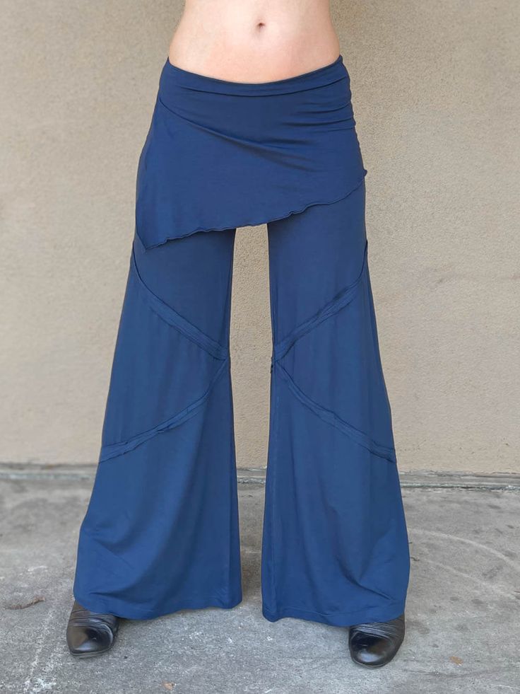 These wide-leg flare pants transition through any season or occasion. Made from a mid-weight rayon jersey fabric that has the perfect flow. The flat-fit fold-over waistband doubles as a skirt. Wide Leg Flare Pants, Womens Jersey, Natural Curves, A Skirt, Draped Fabric, Flare Pants, Jersey Fabric, All Seasons, Wide Leg