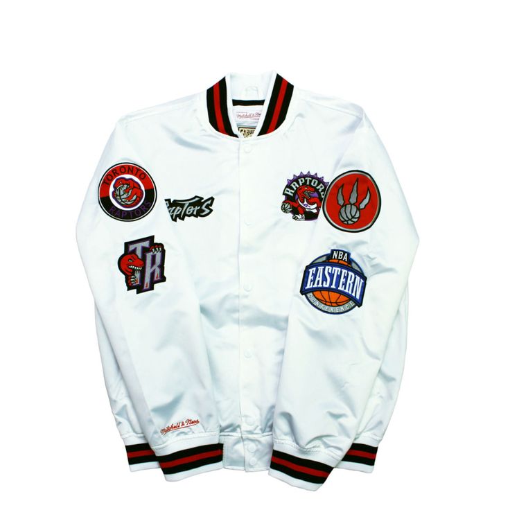 Rep the Six with the City Collection satin jacket for Men! Featuring clean graphics, minimal team color palettes, and high-quality Toronto Raptors embroidered applique patches, show off Toronto Raptors' accolades and colors in style.Details: 100% polyester satin Fully lined in cotton/polyester jersey Striped rib trim at collar, cuffs and waistband Snap front closure Welt pockets Embroidered tackle twill logos and patches Mitchell & Ness script embroidery on right cuff Tailored fit: This style fits a bit trimmer in the body and sleeve Hand wash only. Please refer to specific internal hangtag for additional details Officially licensed NBA product By Mitchell & Ness. Style: OJBF4986TRAYYPW White Streetwear Outerwear With Logo Patch, White Long Sleeve Outerwear With Logo Patch, White Varsity Outerwear With Logo Patch, Sporty Cotton Varsity Jacket With Logo Patch, White Varsity Jacket With Embroidered Logo For Streetwear, Fall White Outerwear With Embroidered Logo, White Varsity Outerwear With Embroidered Logo, Sporty Embroidered Outerwear For Streetwear, White Cotton Track Jacket With Baseball Collar