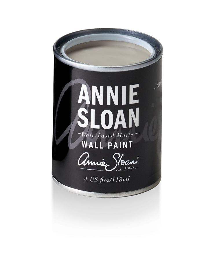 an open can of annie sloan's wall paint on a white background with the words,