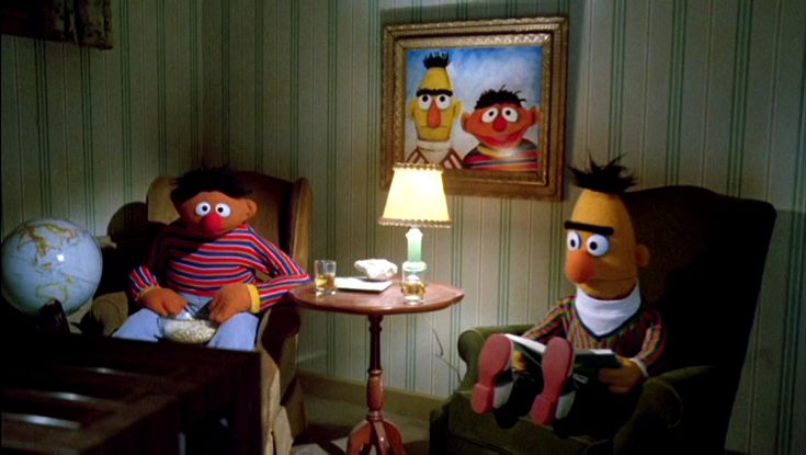 the muppets are sitting in their living room