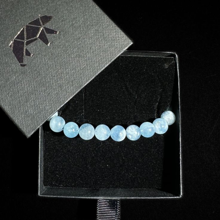 Our Aquamarine beaded bracelets radiate a gentle and tranquil energy that promotes a state of inner peace and serenity. They serve as reminders to embrace a calm and harmonious mindset, allowing you to navigate through life's challenges with grace and tranquility. These bracelets feature polished Aquamarine beads, showcasing the delicate blue hues reminiscent of tranquil waters. Each bead is carefully selected for its natural beauty and soothing energy, creating a bracelet that exudes elegance and serenity. Size: Beads are approximately 8.0-12.0mm each Color: Blue/White Origin: Brazil Size and color may vary Intuitively picked for you! Any visible imperfections and/or cracks are due to natural formation. Product color may slightly vary due to photographic lighting sources! Disclaimer: Crys Minimalist Hand-strung Beaded Bracelets For Meditation, Minimalist Beaded Bracelets As Gift, Minimalist Gemstone Beads Bracelets For Meditation, Minimalist Gemstone Beaded Bracelets For Meditation, Minimalist Round Beads Bracelets For Meditation, Adjustable Light Blue Healing Bracelets, Light Blue Spiritual Bracelet As Gift, Blue Spiritual Healing Friendship Bracelets, Everyday Blue Amazonite Bracelets