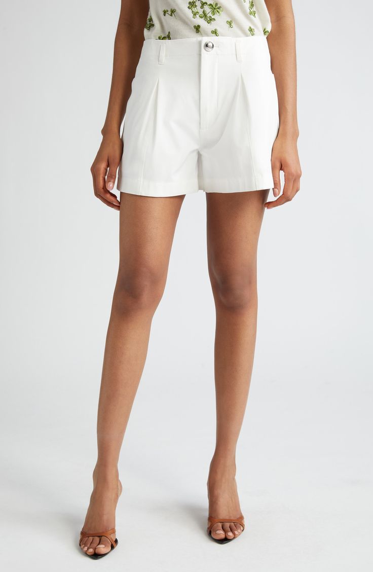 Keep your warm-weather look polished in these shorts impeccably tailored from stretch cotton and relaxed with front pleats. 4" inseam; 28" leg opening; 11 1/2" front rise; 15 1/2" back rise (size 44 IT) Zip fly with button closure Front slant pockets 95% cotton, 5% elastane Dry clean or machine wash, dry flat Made in Italy Designer Clothing Designer Clothing Brands, Look Polished, Satin Shorts, Tailored Shorts, Pleated Shorts, Giambattista Valli, Cotton Shorts, Stretch Cotton, Printed Shorts