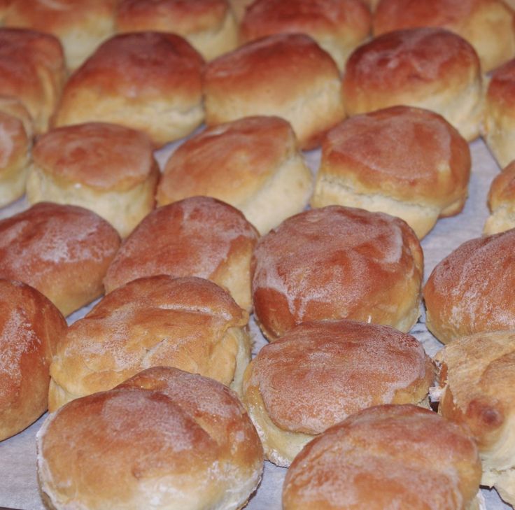 rolls are lined up and ready to be baked in the oven or on the table