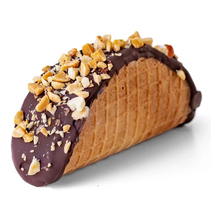 a chocolate covered pastry with nuts on it's top and bottom half, sitting in front of a white background