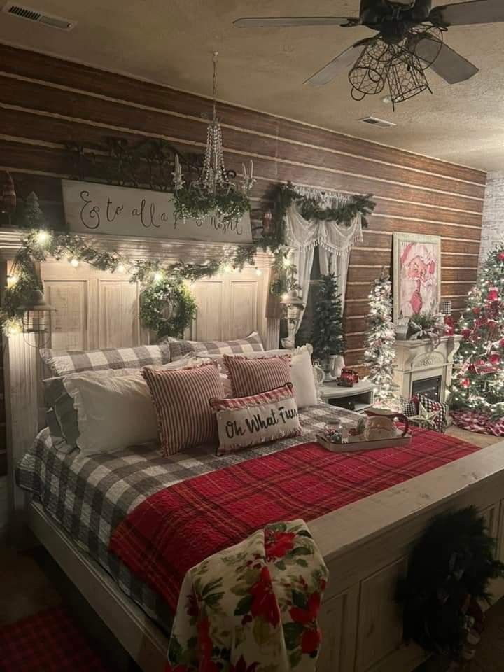 a bedroom decorated for christmas with lights and decorations