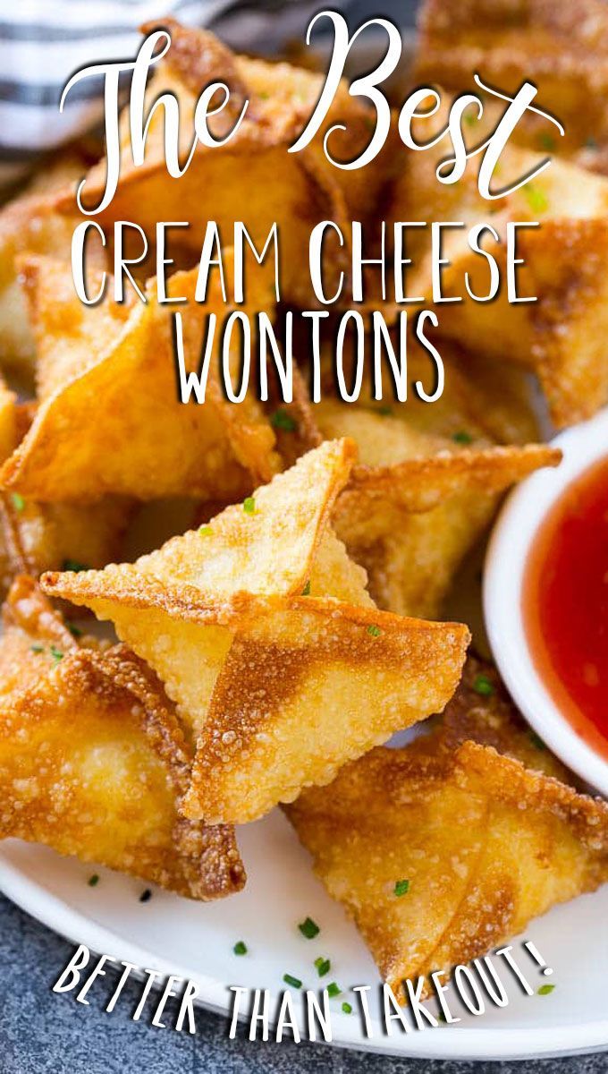 the best cream cheese wontons with ketchup is on a white plate