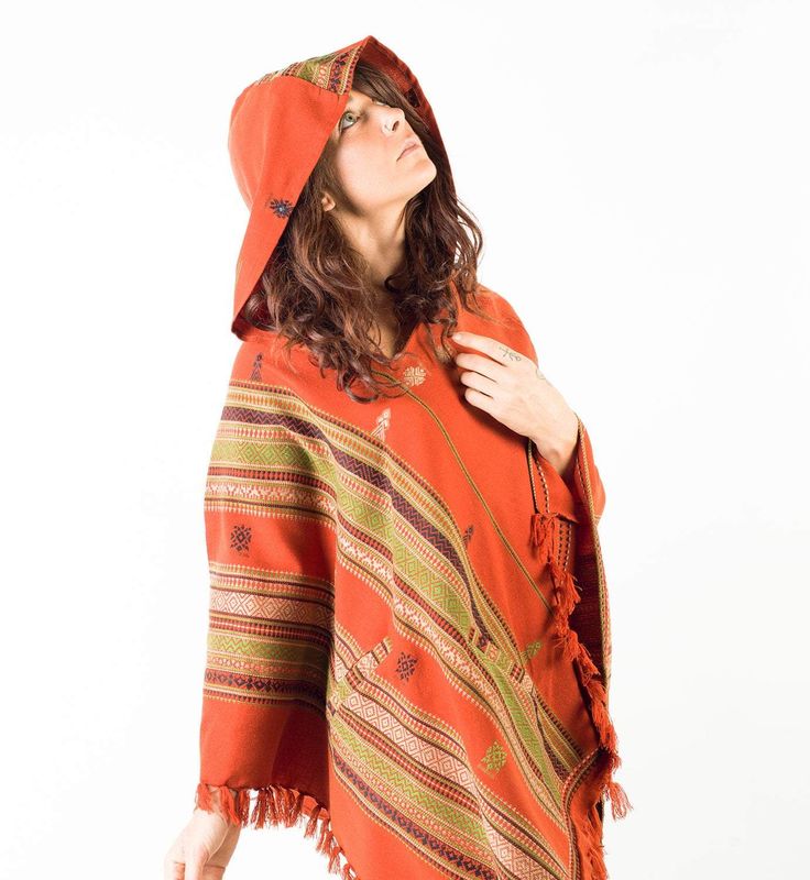 Meet Our Handmade High Quality Light Wool Poncho . . . Featuring a large hood, embroidered tribal pattern and two pockets . . . Bohemian, Stylish and super comfortable . . . One size fits all (exact measurements in photos) Measurements: From neck to tip 88cm (35 inches) Hood size 37cm (15 inches) Traditional One Size Hooded Poncho, Bohemian Hooded Cape For Festivals, Bohemian Hooded Brown Poncho, Red Hooded Bohemian Poncho, Red Bohemian Hooded Poncho, Red Long Sleeve Poncho For Festival, Hippie Hooded Poncho For Festivals, Hippie Long Sleeve Poncho, Bohemian Hooded Poncho For Fall