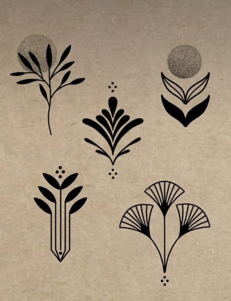 four different types of flowers on a piece of paper with black and white ink in the middle