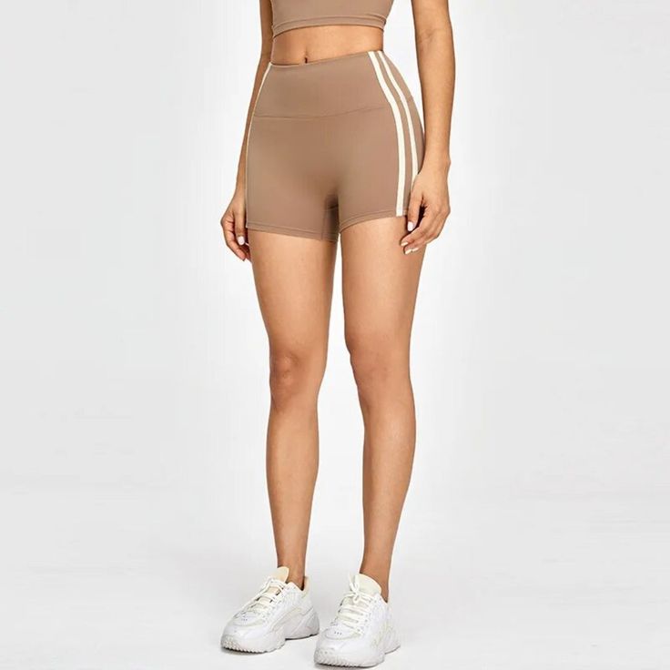 Camel Stride Shorts | Daniki Limited Beige High Stretch Yoga Pants For Workout, Beige High-stretch Yoga Pants For Workout, High Stretch Beige Yoga Pants For Workout, Sporty Brown Bottoms With Short Leg, Sporty Brown Short Leg Bottoms, Casual Brown Stretch Athletic Shorts, Sporty Brown Shorts, Brown Athleisure Activewear With Built-in Shorts, Beige Stretch Yoga Pants Athleisure