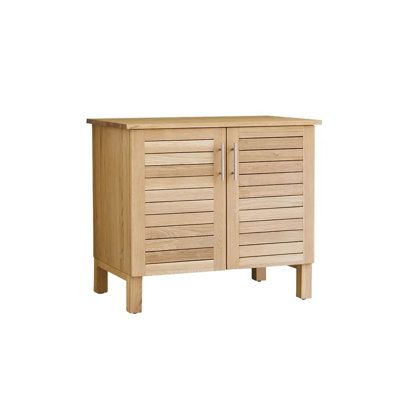 a wooden cabinet with two doors and drawers